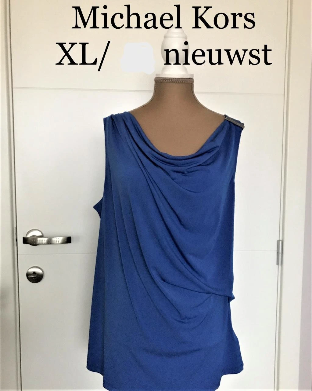 Michael Kors XL/42 fel blauw bloesje zonder mouwen .